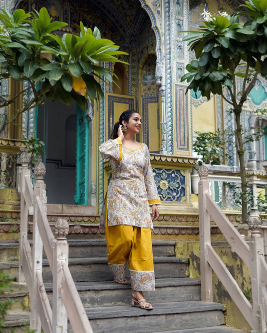 Mustard Yellow Printed Kurta with Paisley Pattern & Elegant Border Detail